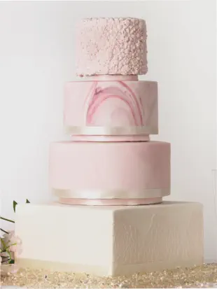 Elegant Pink Wedding Cake, ruffled top tier, marbled effect fondant